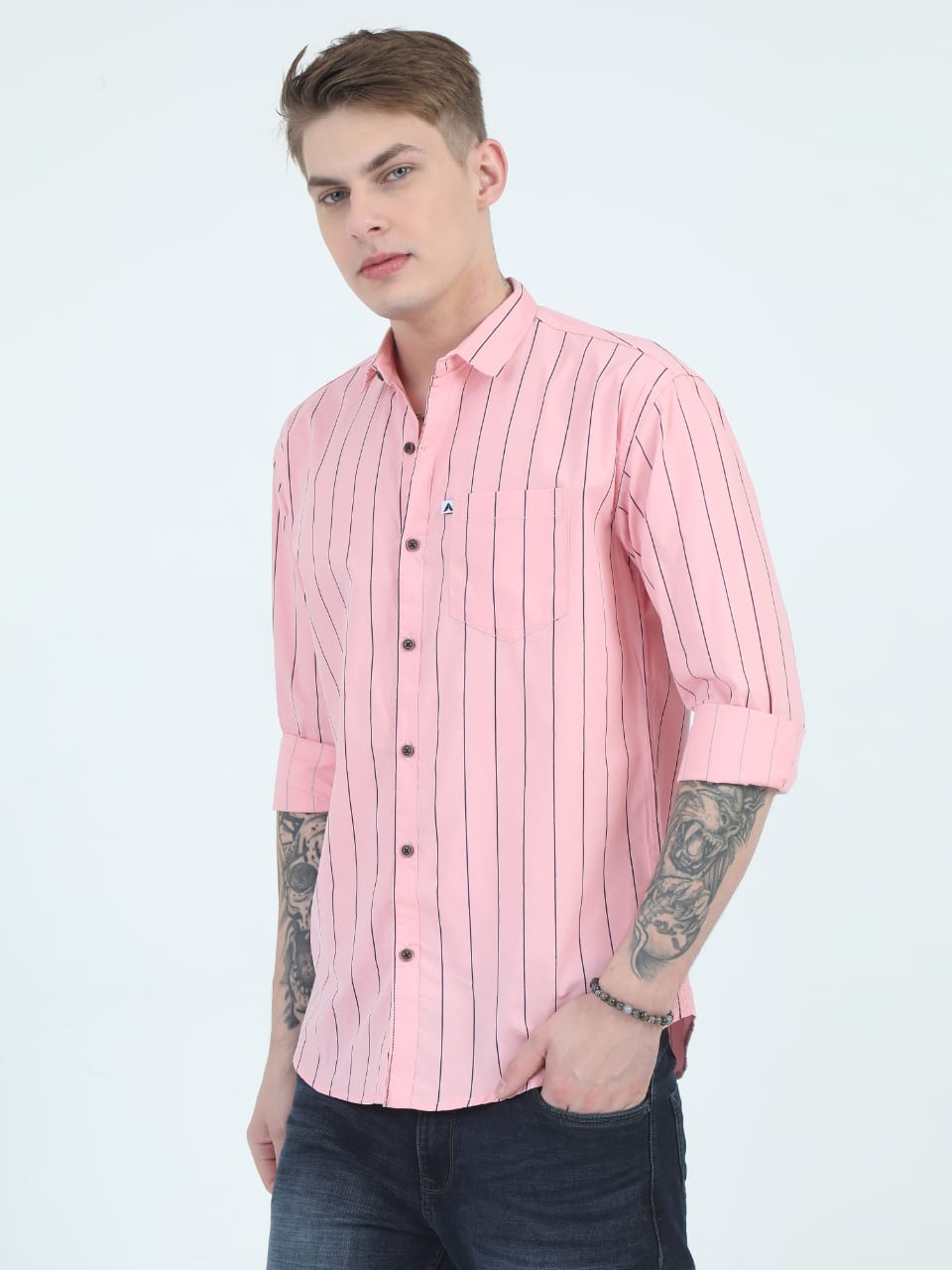 Man wearing a pink striped shirt on a white background