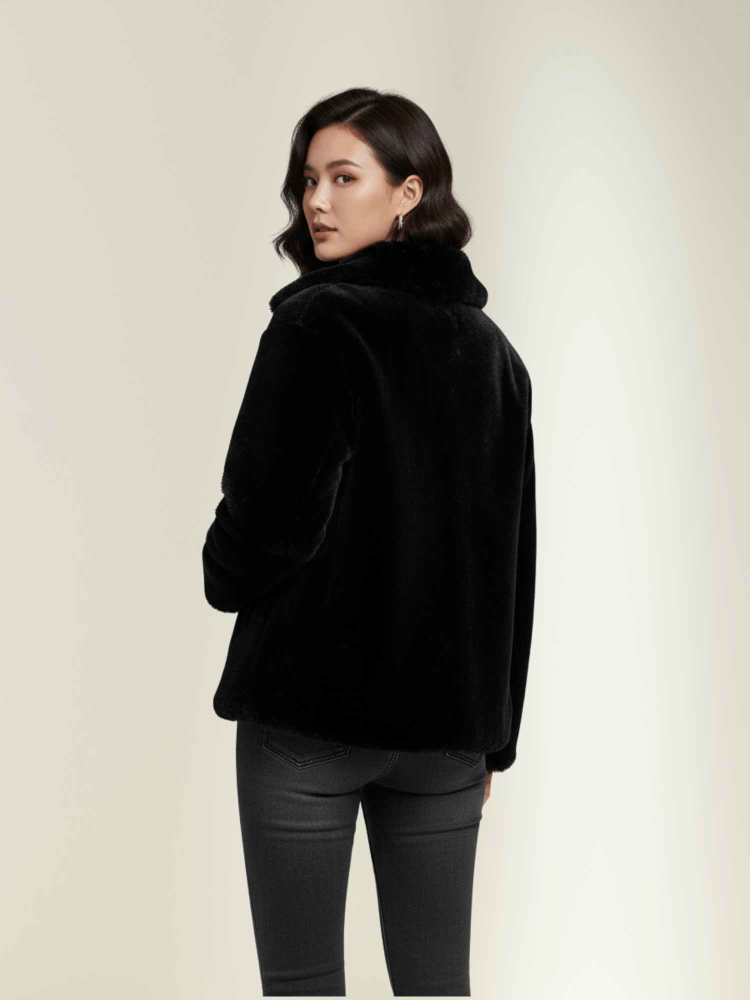 black rabbit fur winter jacket, showcasing back design and plush texture