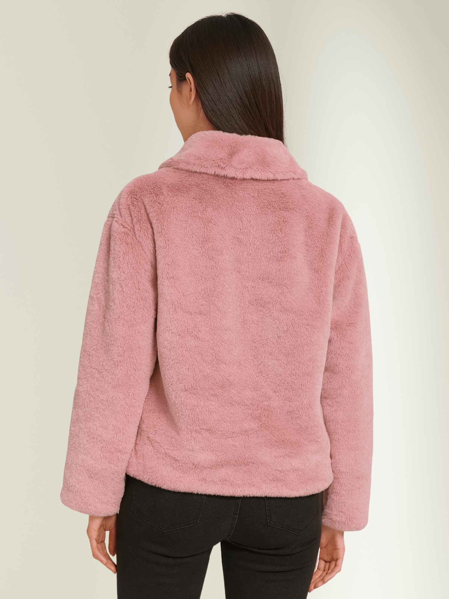 a pink RABBIT fur jacket with a white top and high-waist black jeans