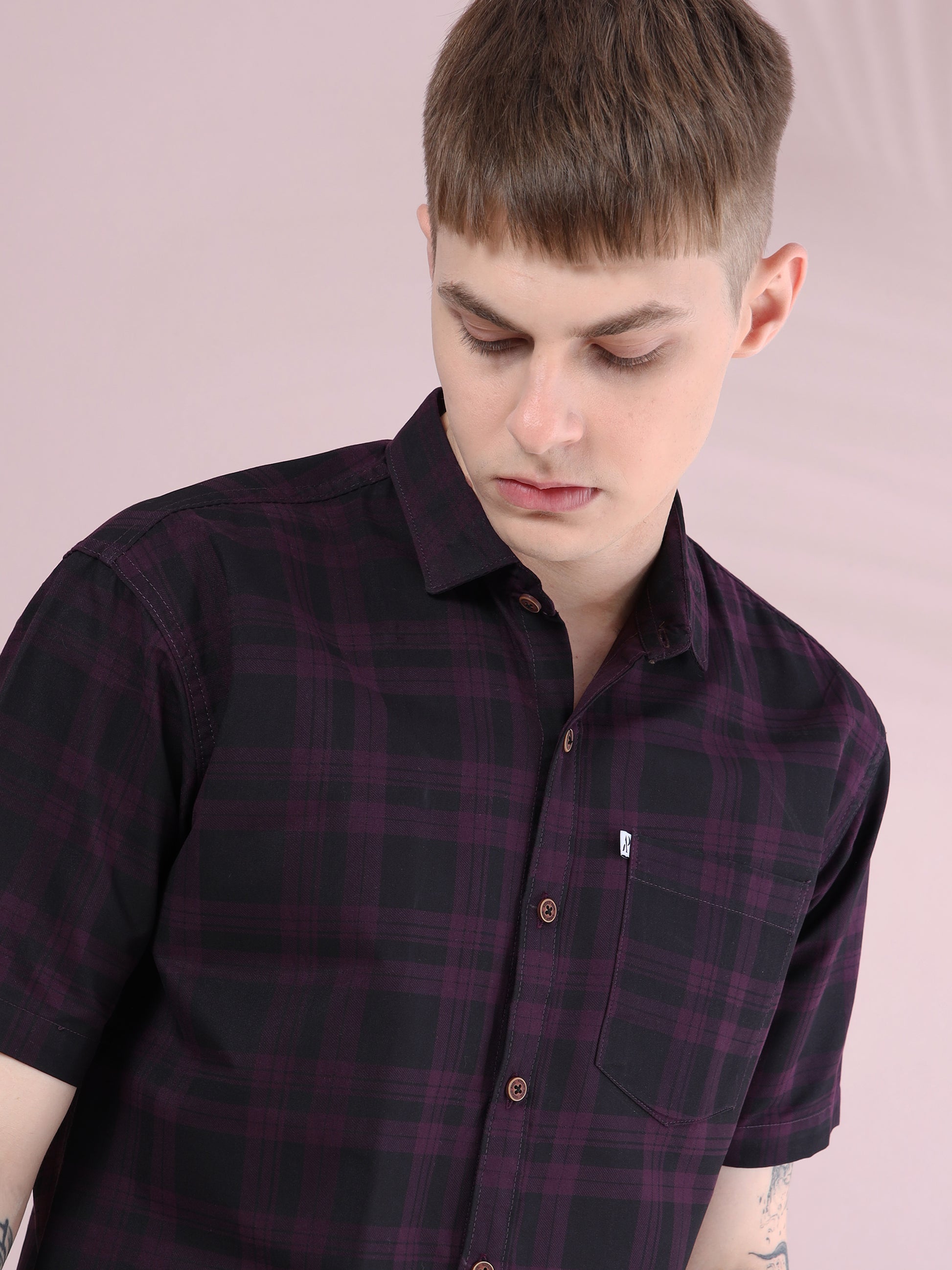 Men, casual short sleeve maroon and black plaid shirt, chest pocket close-up view