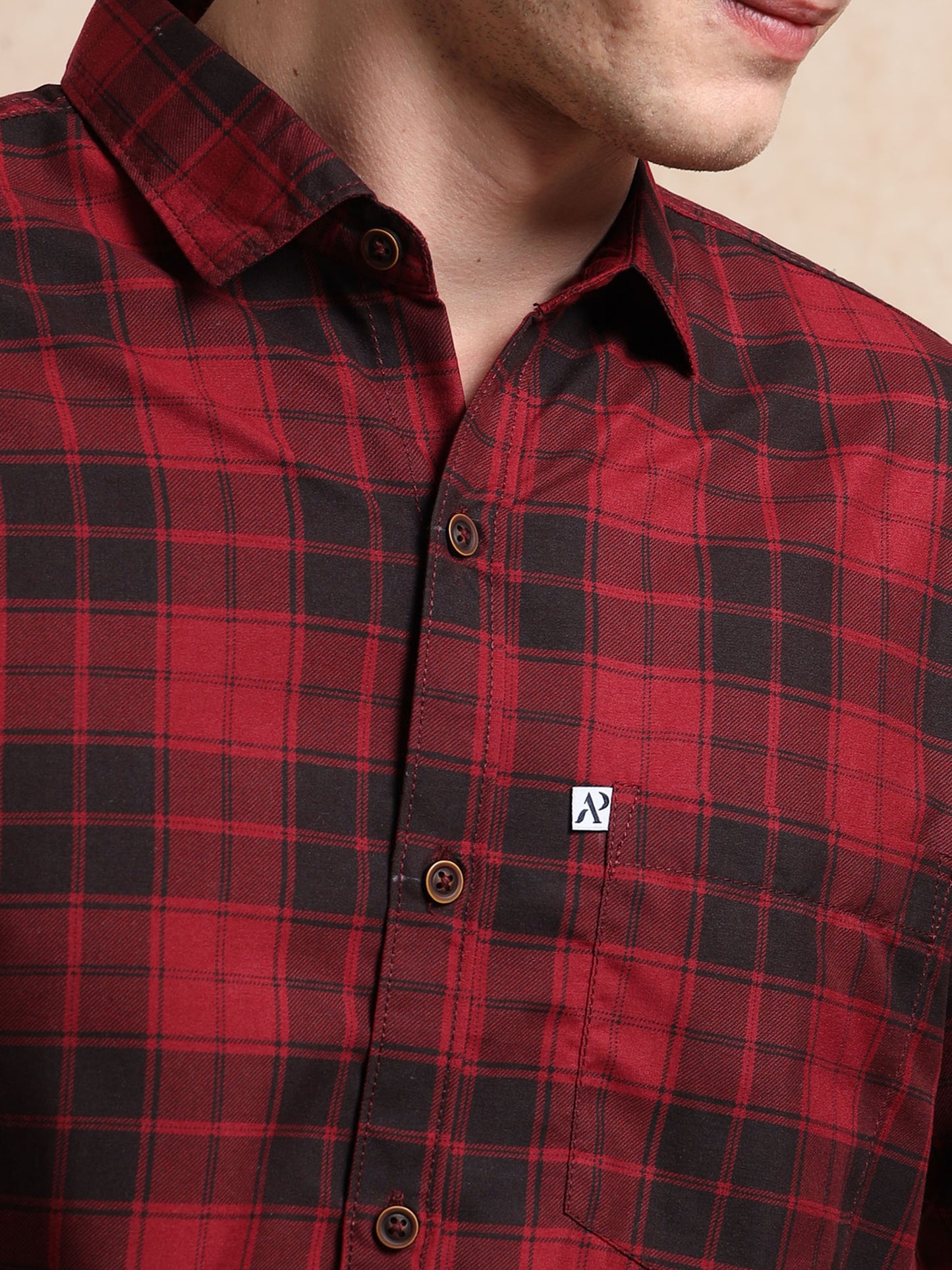 red and black checked men, shirt with buttons and chest pocket branding