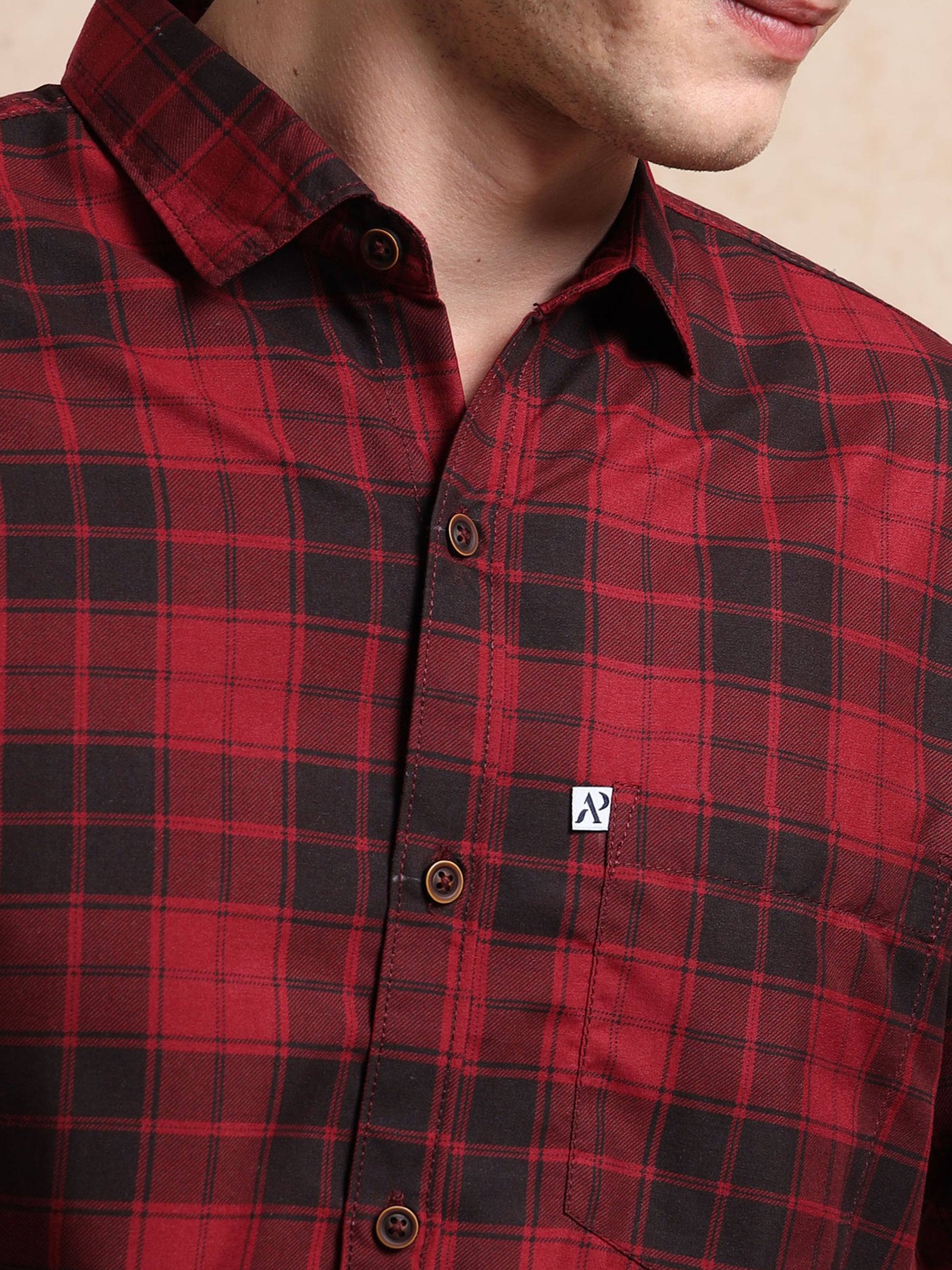 red and black checked men, shirt with buttons and chest pocket branding