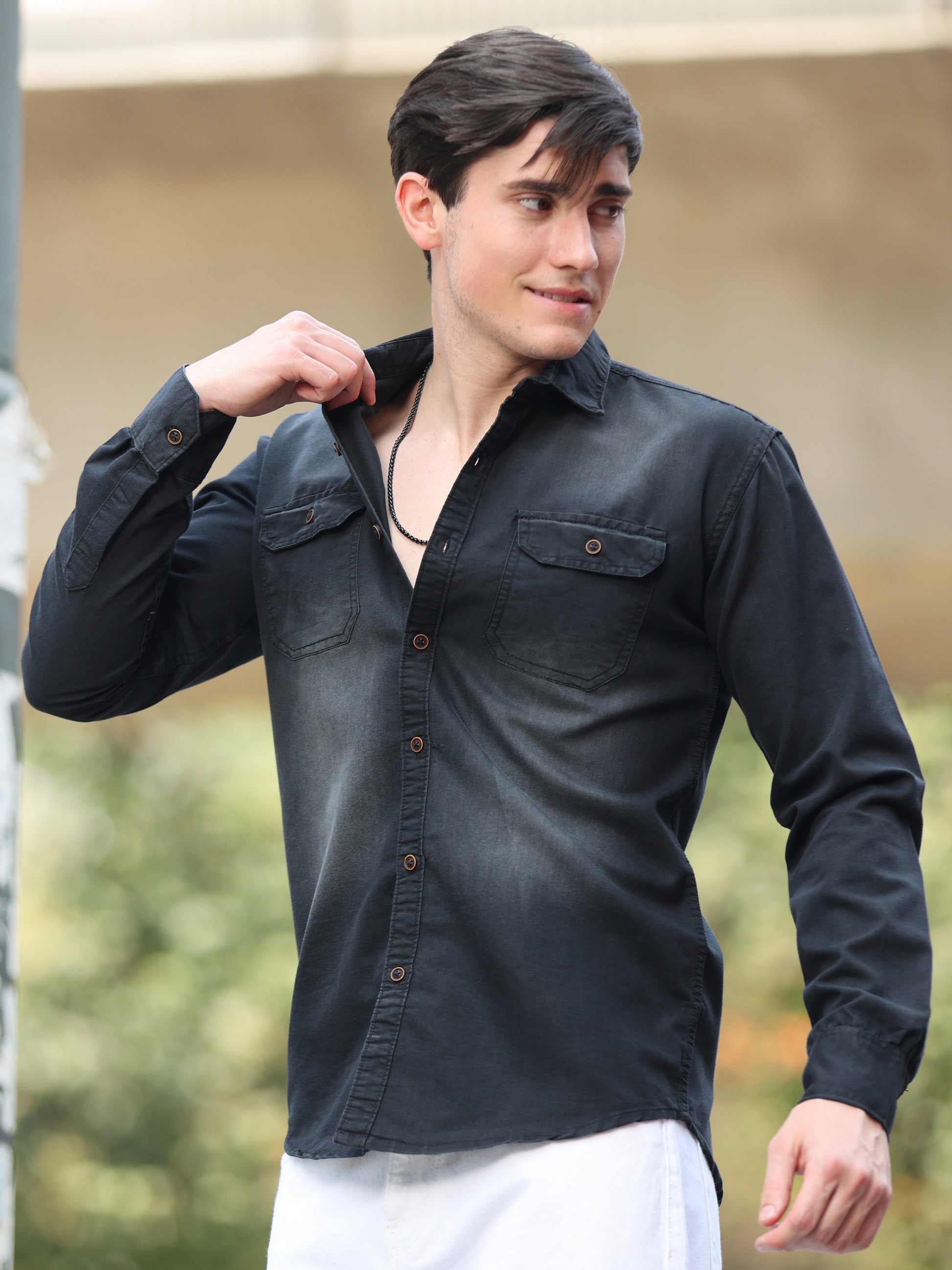 Trendy men's full sleeve black denim shirt with front pockets and soft wash finish