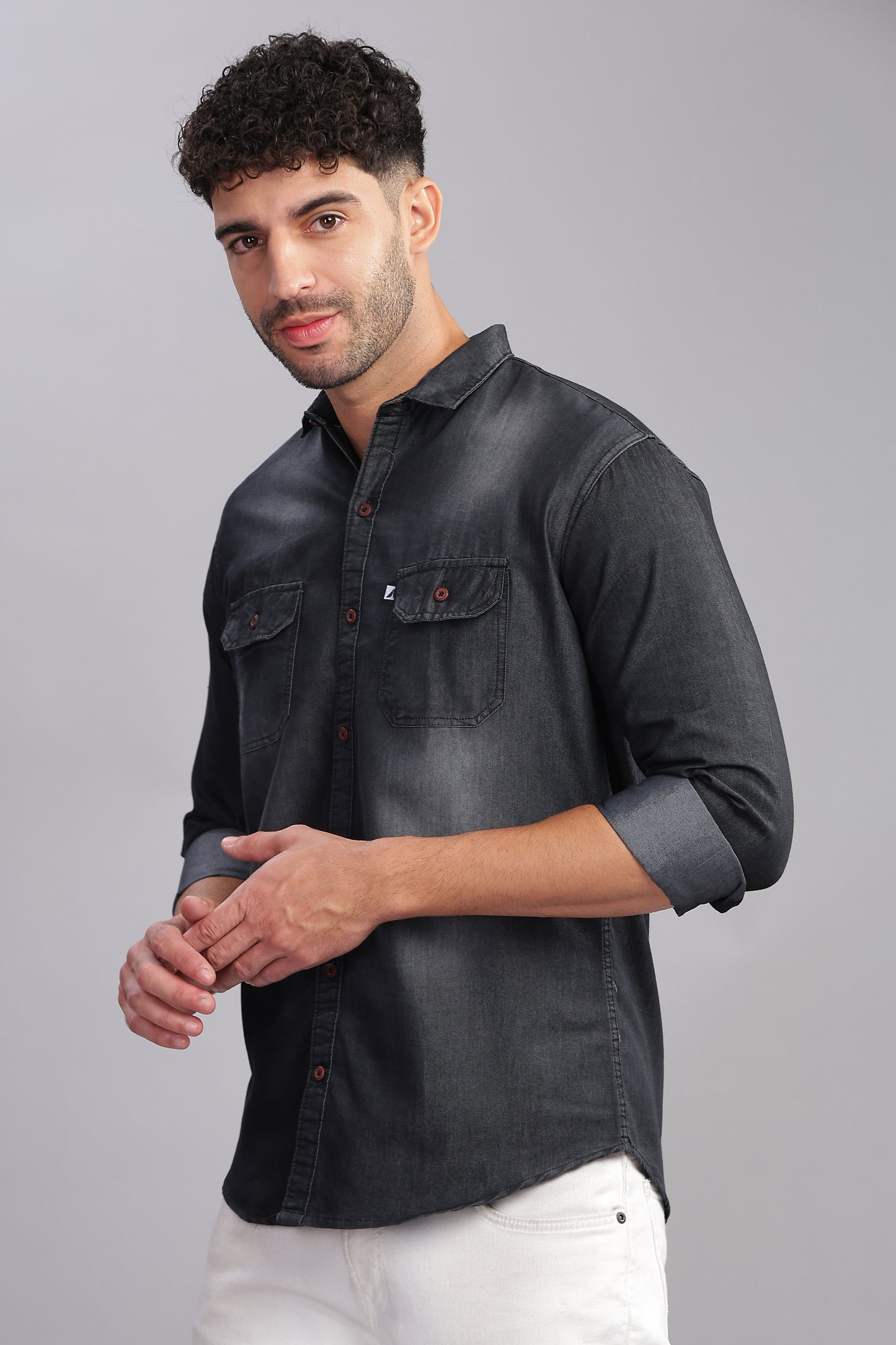 Stylish black faded denim shirt for men with button-down front and casual fit