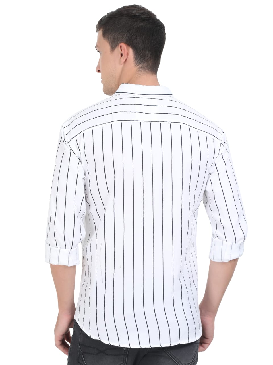 Man wearing a white shirt with black vertical stripes on a white background