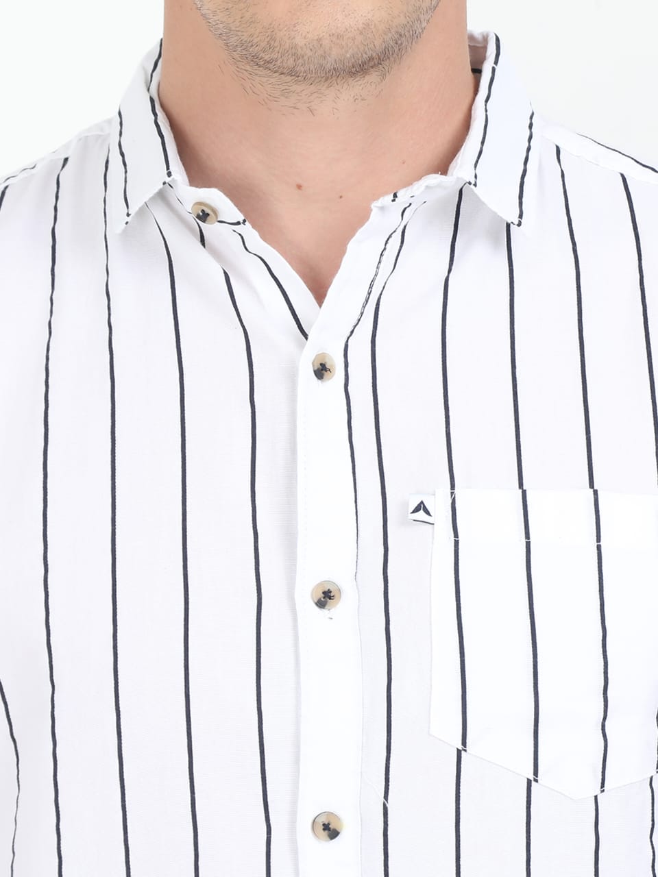 White shirt with black vertical stripes worn by a person on a white background