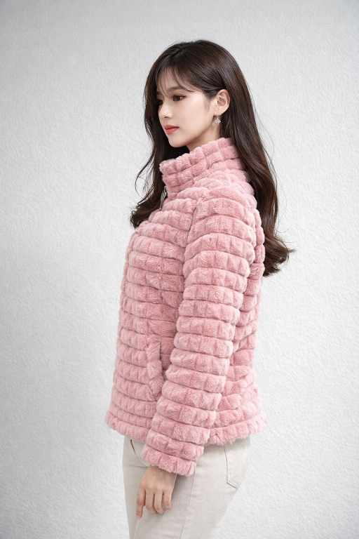 women, plush pink winter jacket showing ribbed faux fur texture and high neck design