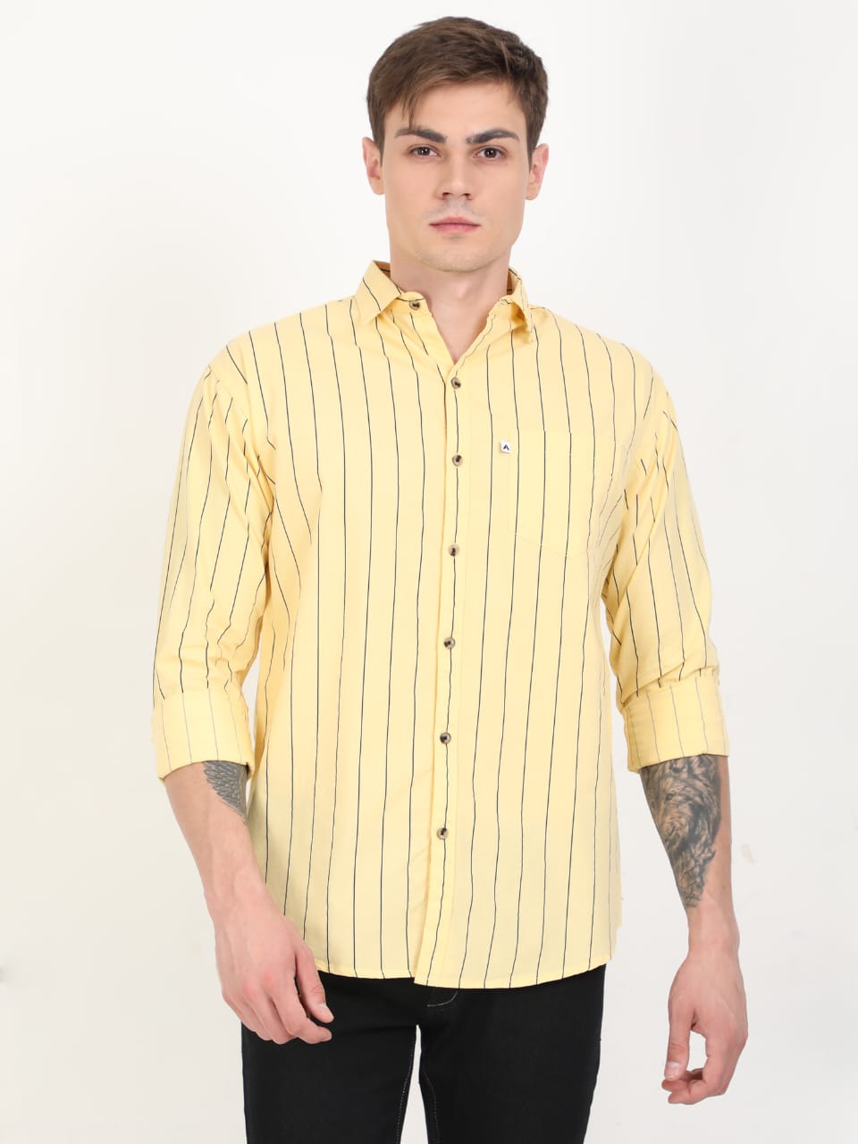 Man wearing a yellow striped shirt on a white background