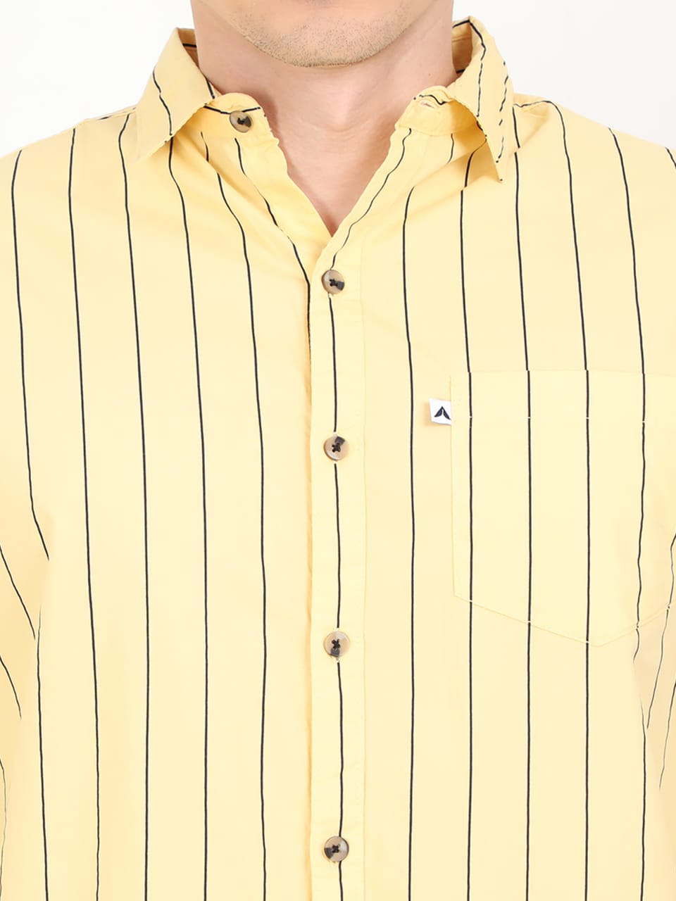 Yellow striped shirt with a brand logo on a white background